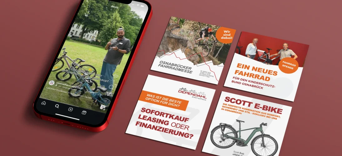 Smartphone mit Video über Fahrräder, umgeben von Werbeflyern zu Fahrrad-Events auf rot-braunem Hintergrund.
